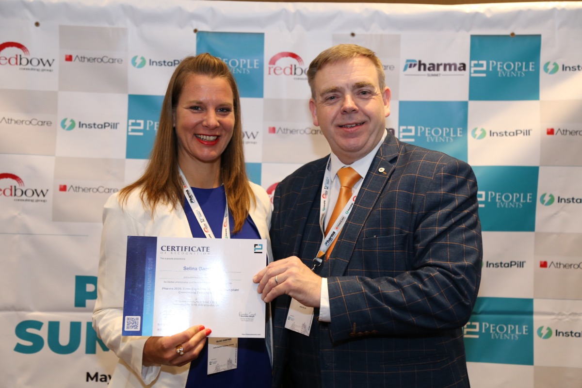Selina Gaertner receiving her speaker certificate at the Global Pharma Tech Summit 2026